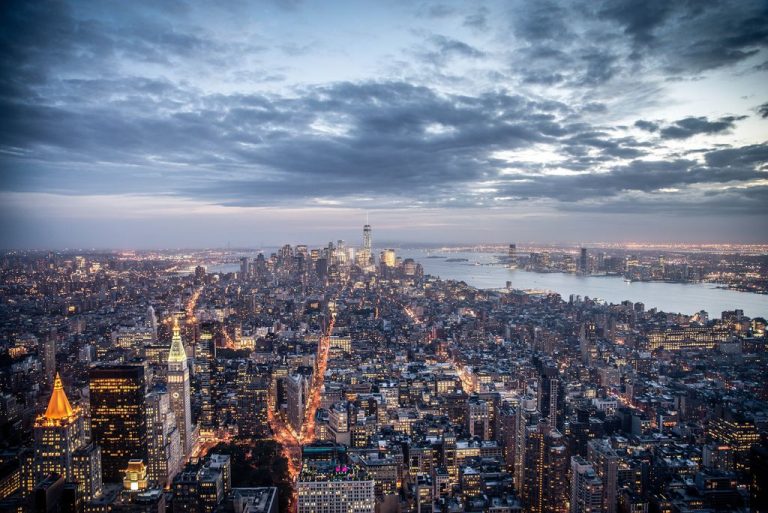 New York City sunset skyline aerial view with office buildings,skyscrapers and Hudson River.